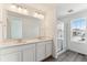 Bathroom with double vanity and large walk-in shower at 9663 Ceylon St, Commerce City, CO 80022