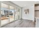 Bright dining area with sliding glass doors leading to a patio at 9663 Ceylon St, Commerce City, CO 80022