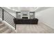 Finished basement recreation room with a stone fireplace and plush seating at 3343 S Newcombe St, Lakewood, CO 80227