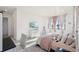 Cozy bedroom with a tv and window seating at 3343 S Newcombe St, Lakewood, CO 80227