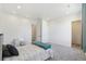 Bright bedroom with carpeted floor and access to a closet at 3343 S Newcombe St, Lakewood, CO 80227