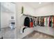 Spacious walk-in closet with ample shelving and hanging space at 3343 S Newcombe St, Lakewood, CO 80227