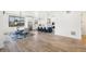Open concept kitchen boasts modern appliances and a large island at 3343 S Newcombe St, Lakewood, CO 80227