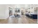 Spacious kitchen with island, stainless steel appliances, and backyard access at 3343 S Newcombe St, Lakewood, CO 80227