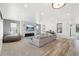 Spacious living room featuring a stone fireplace and hardwood floors at 3343 S Newcombe St, Lakewood, CO 80227