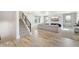 Modern staircase with metal railing leading to the upper level at 3343 S Newcombe St, Lakewood, CO 80227