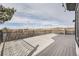 Large back deck overlooking picturesque landscape and iron railing detail at 1635 Sharps Ct, Castle Rock, CO 80109