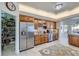 Functional kitchen with stainless steel refrigerator and walk-in pantry at 1635 Sharps Ct, Castle Rock, CO 80109