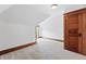 Finished attic space features plush carpeting and classic wood trim and door accents at 3330 W 30Th Ave, Denver, CO 80211