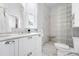 Elegant bathroom with dual vanity and marble shower at 3330 W 30Th Ave, Denver, CO 80211