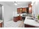 Kitchen features stainless steel appliances, granite countertops, and wood cabinetry at 3330 W 30Th Ave, Denver, CO 80211