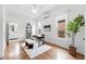 Bright home office features hardwood floors, natural lighting, and access to an ensuite bathroom at 3330 W 30Th Ave, Denver, CO 80211