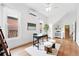 Bright home office features hardwood floors, natural lighting, a ceiling fan, and air conditioning at 3330 W 30Th Ave, Denver, CO 80211