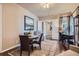 Comfortable sitting room with natural light and an elegant, neutral area rug at 15637 Deer Mountain Cir, Broomfield, CO 80023