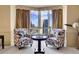 Cozy sitting area with large window and a view of the city at 1777 Larimer St # 902, Denver, CO 80202