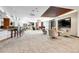 Bright and open lounge area with modern lighting, cozy seating, and stylish decor, perfect for relaxing and socializing at 1777 Larimer St # 902, Denver, CO 80202