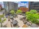 Outdoor terrace featuring seating, grills, and lush landscaping, ideal for entertaining and enjoying the city views at 1777 Larimer St # 902, Denver, CO 80202