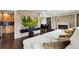 Spacious living room with stone fireplace and large sectional sofa at 11921 W 70Th Pl, Arvada, CO 80004