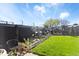 Lush backyard with a garden and raised beds, perfect for outdoor enjoyment and gardening enthusiasts at 10405 W 107Th Pl, Broomfield, CO 80021