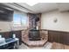 Finished basement featuring brick fireplace and neutral decor at 10405 W 107Th Pl, Broomfield, CO 80021