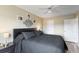 Comfortable bedroom featuring a ceiling fan, modern accents, and beautiful lighting at 10405 W 107Th Pl, Broomfield, CO 80021