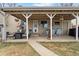 Covered patio featuring comfortable seating, perfect for outdoor relaxation and enjoying the backyard view at 10405 W 107Th Pl, Broomfield, CO 80021