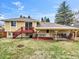 Expansive backyard featuring a deck and patio, perfect for outdoor entertaining and relaxation at 1062 Cottonwood St, Broomfield, CO 80020