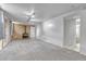 Finished basement with wood-burning stove, new carpet, and an updated ensuite bathroom at 3463 W Bowles Ave, Littleton, CO 80123