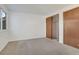 Comfortable bedroom with carpet, closet and window at 10450 W 81St Pl, Arvada, CO 80005