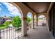 Arched balcony overlooking the neighborhood on a sunny day at 2264 S Joyce St, Lakewood, CO 80228