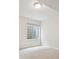 Basement bedroom featuring carpet, neutral walls, and window well at 2264 S Joyce St, Lakewood, CO 80228