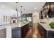 Gourmet kitchen with a large island and stainless steel appliances at 2264 S Joyce St, Lakewood, CO 80228