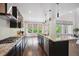 Spacious kitchen featuring granite countertops and stainless appliances at 2264 S Joyce St, Lakewood, CO 80228