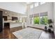 Bright and airy living space with hardwood floors and large windows at 2264 S Joyce St, Lakewood, CO 80228