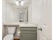 Compact bathroom featuring modern fixtures, a stylish sink, and a clean, functional design at 9917 Garland Dr, Broomfield, CO 80021