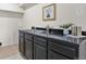 Basement bar area with a stainless steel sink and ample counter space at 30221 Stagecoach Blvd, Evergreen, CO 80439