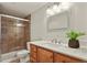 Bathroom boasts a tiled shower, sleek vanity, and modern fixtures offering a comfortable space at 30221 Stagecoach Blvd, Evergreen, CO 80439