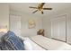 Bedroom with a ceiling fan, wood-look floors and a closet at 30221 Stagecoach Blvd, Evergreen, CO 80439