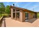 Back deck features large windows into the home at 30221 Stagecoach Blvd, Evergreen, CO 80439