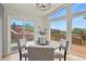 Charming dining nook with large windows and views at 30221 Stagecoach Blvd, Evergreen, CO 80439