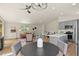Open layout showcasing living, dining, and kitchen areas at 30221 Stagecoach Blvd, Evergreen, CO 80439