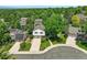 Charming two-story home with a well-maintained lawn and a two-car garage surrounded by lush green trees at 6979 E Fremont Ave, Centennial, CO 80112