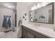 Bathroom featuring a shower and white marble sink at 6979 E Fremont Ave, Centennial, CO 80112