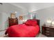 Comfortable bedroom featuring a large bed, ambient lighting, and neutral decor at 6979 E Fremont Ave, Centennial, CO 80112