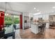 Bright kitchen with stainless appliances, breakfast nook, and backyard access at 6979 E Fremont Ave, Centennial, CO 80112