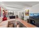 Bright living room with a split staircase, modern accents, and generous space at 6979 E Fremont Ave, Centennial, CO 80112