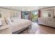 Main bedroom features sliding door access to a private balcony with scenic views at 6979 E Fremont Ave, Centennial, CO 80112