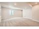 Finished basement has a large space with a window and recessed lighting; room for entertainment and comfort at 2387 Bristol St, Superior, CO 80027