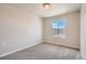 Bright bedroom with a large window overlooking the neighborhood at 2387 Bristol St, Superior, CO 80027