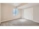 The room features a sliding-door closet, a window, and neutral carpeting and paint, creating a warm ambiance at 2387 Bristol St, Superior, CO 80027